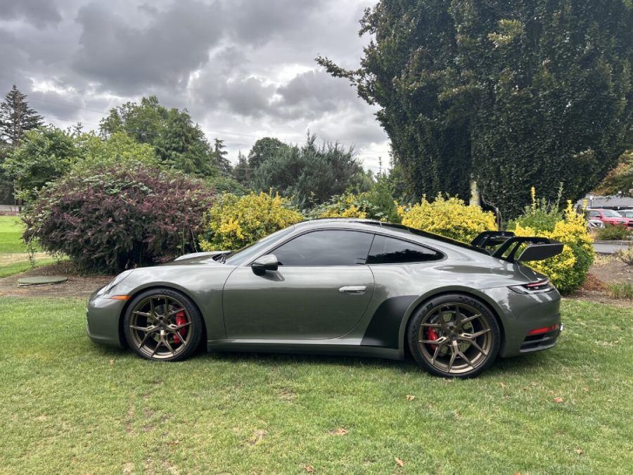 The 2021 Porsche 911 Carrera S is the perfect mix of iconic design and thrilling performance. Whether you’ve loved Porsche for years or are just getting into high-end sports cars, the new Porsche 911 is guaranteed to impress. Renting a Porsche 911, Vancouver allows you to experience the iconic 911 design and exhilarating driving experience, making it a car you'll remember for a long time.Performance Features The 2021 Porsche 911 Carrera S offers 3.0-liter twin-turbo flat-six engine with 443 horsepower Launch control system, delivering 0-30 mph in 1.1 seconds 8-speed PDK dual-clutch transmission for seamless gear shifts Exterior Features This 911 Porsche has sleek, aerodynamic body with a lowered front profile 20-inch front and 21-inch rear wheels for superior grip LED Matrix headlights with Porsche Dynamic Light System for enhanced visibility Interior Features The Porsche 911 Carrera S has 14-way power-adjustable sports seats with memory function Porsche Communication Management (PCM) with a 10.9-inch touchscreen Premium Bose surround sound system for immersive audio 