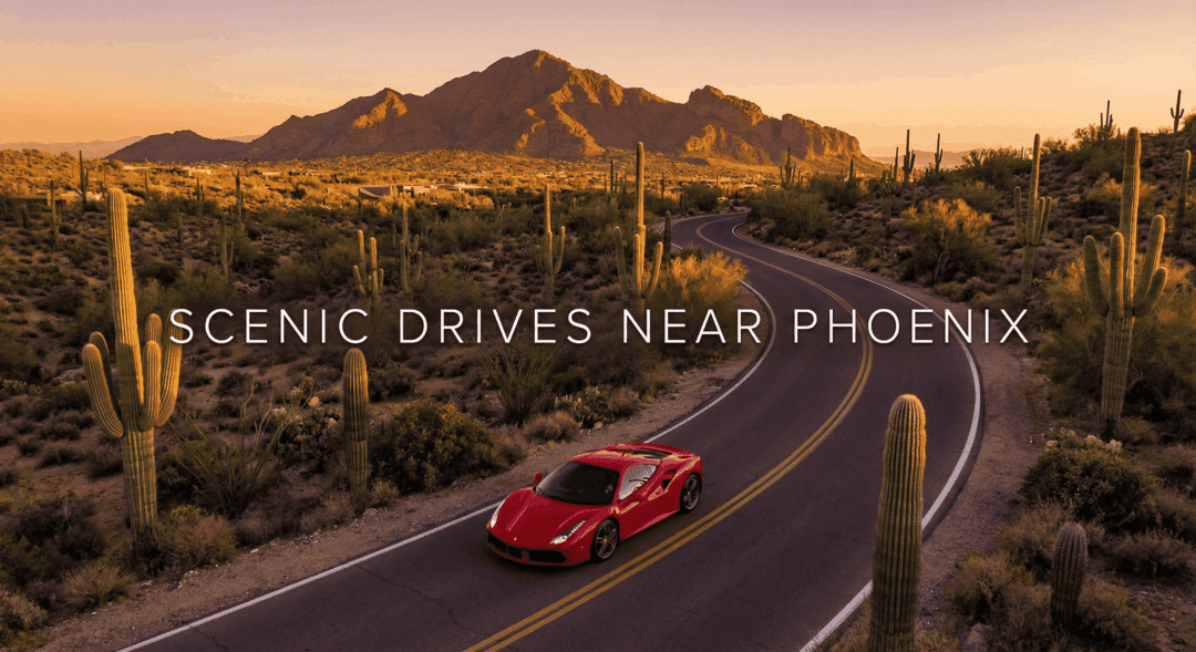 Ferrari driving through Phoenix desert landscape near Camelback Mountain.