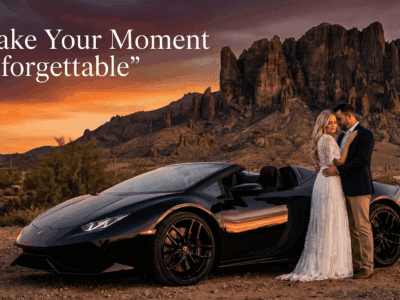 Couple posing beside a red Lamborghini at sunset in Arizona desert with mountains in the background.