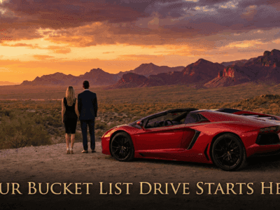 Exotic car parked at sunset in the Phoenix desert with a driver looking out at the horizon.
