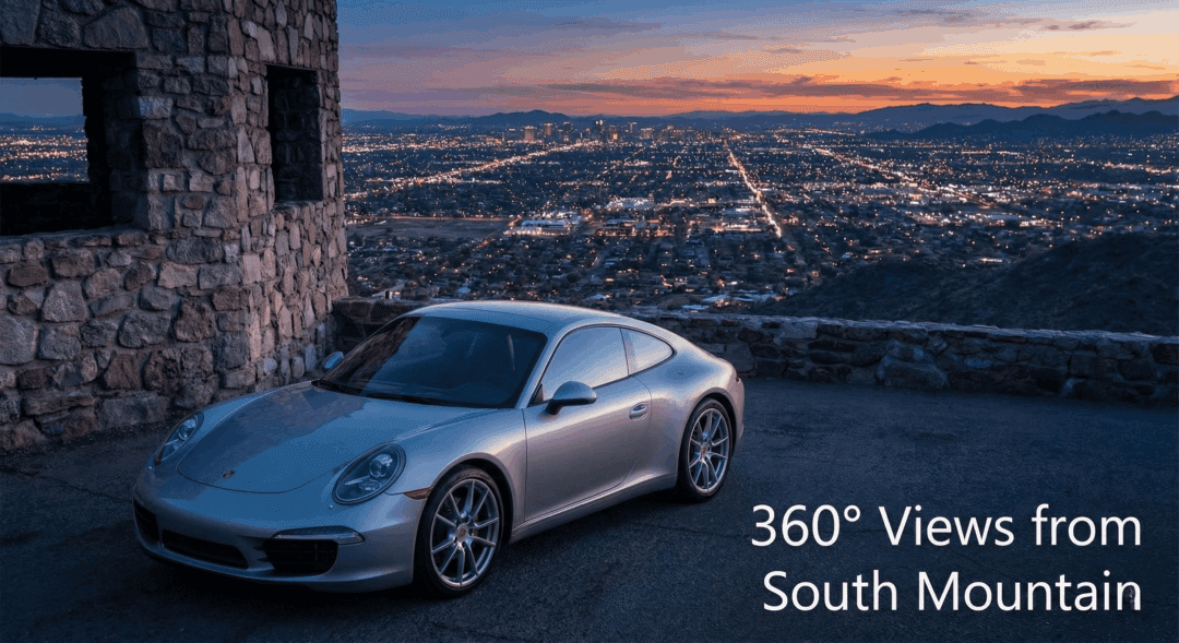 Porsche 911 at Dobbins Lookout overlooking Phoenix skyline at sunset.